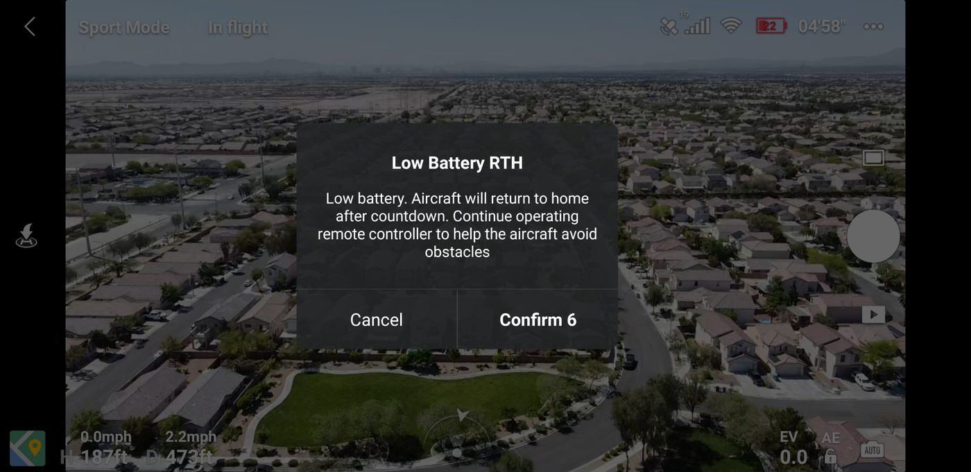 DJI Fly app showing a Low Battery RTH countdown dialog at 22 percent